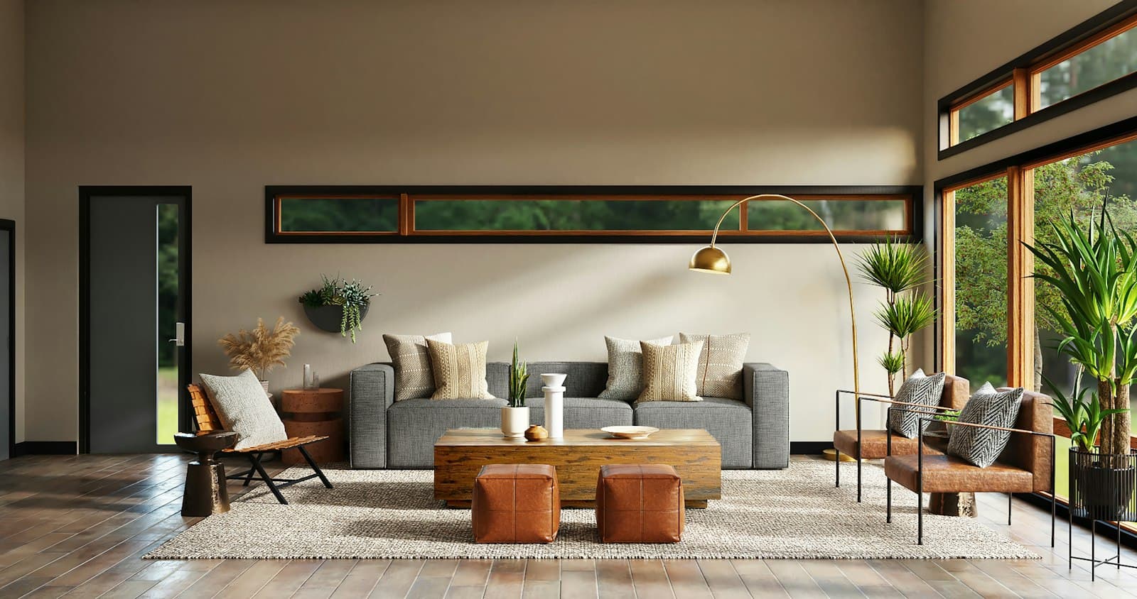A warm, sunlit living room with a grey sofa, leather ottomans and indoor plants